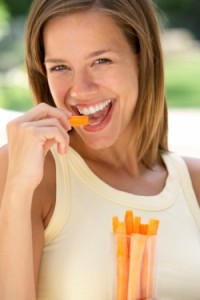 woman_eating_carrot_350x525